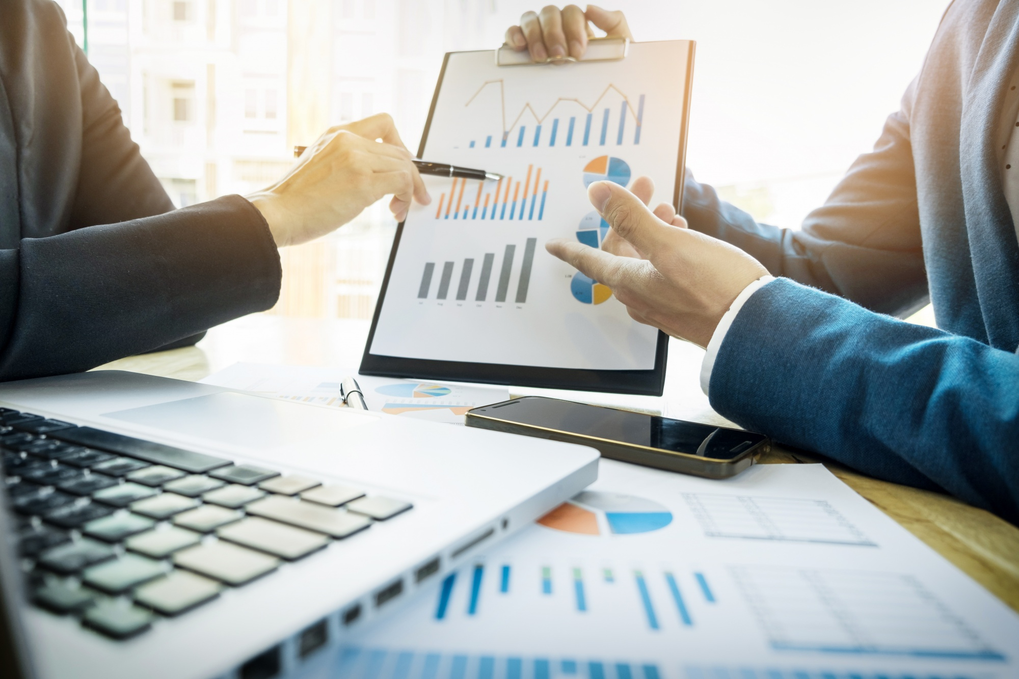 Vestano in-house departments reviewing business analytics