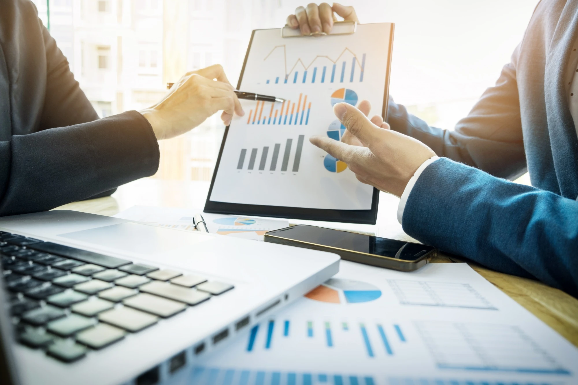 Vestano in-house departments reviewing business analytics